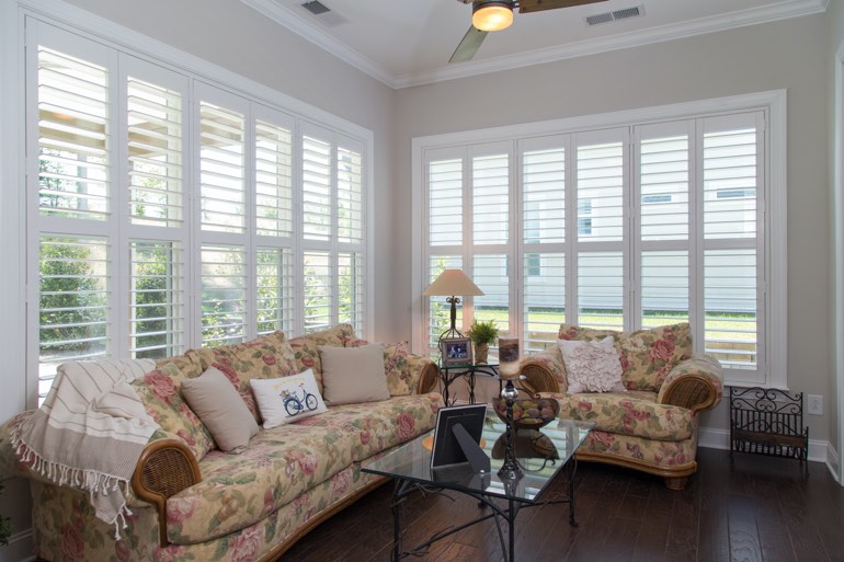 Sunroom with interior shutters in New York.